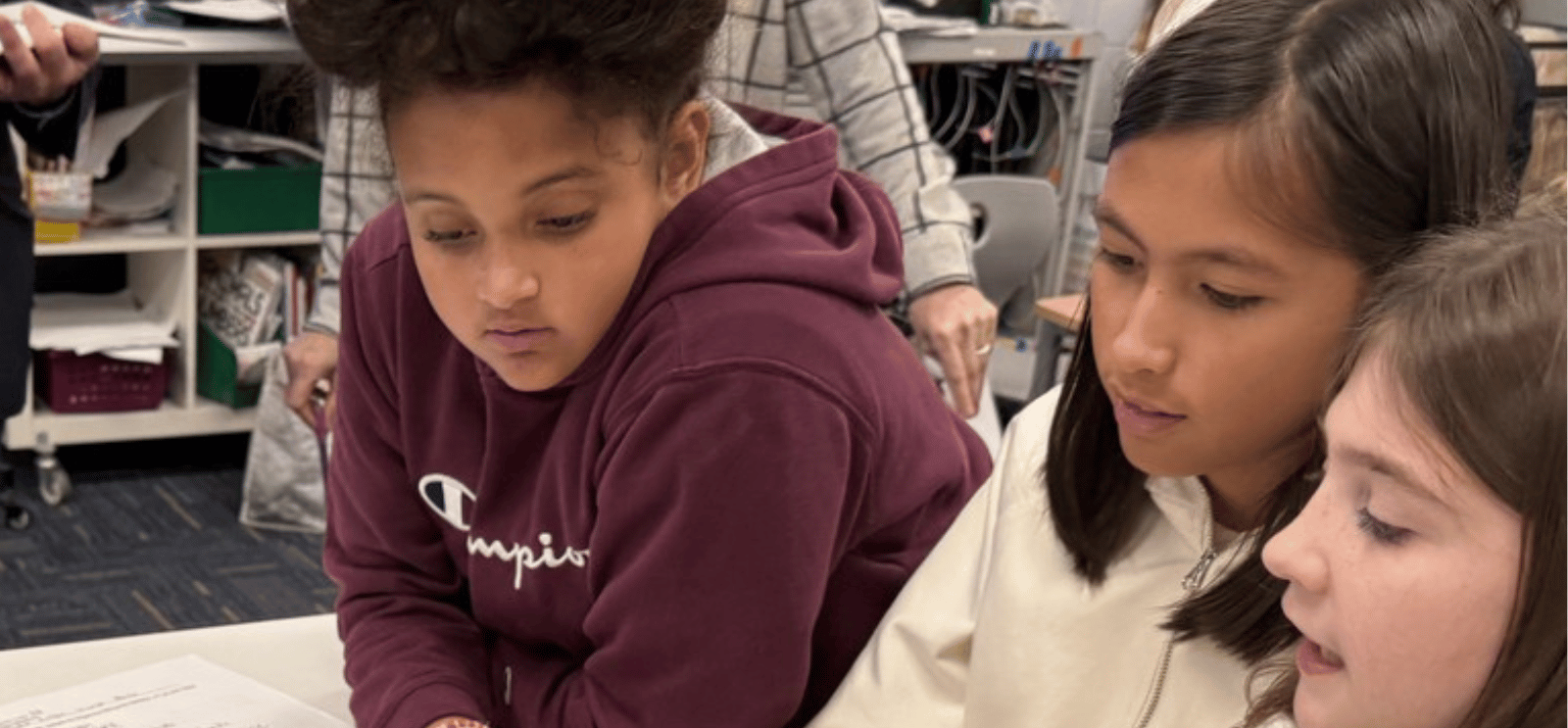 3 Students working on a project