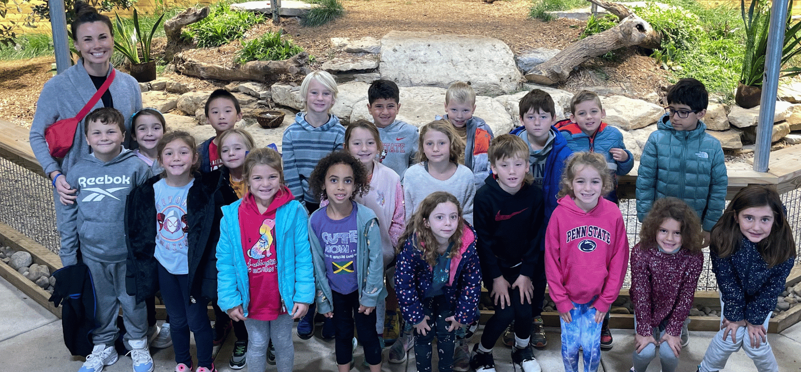 students and teacher on a field trip