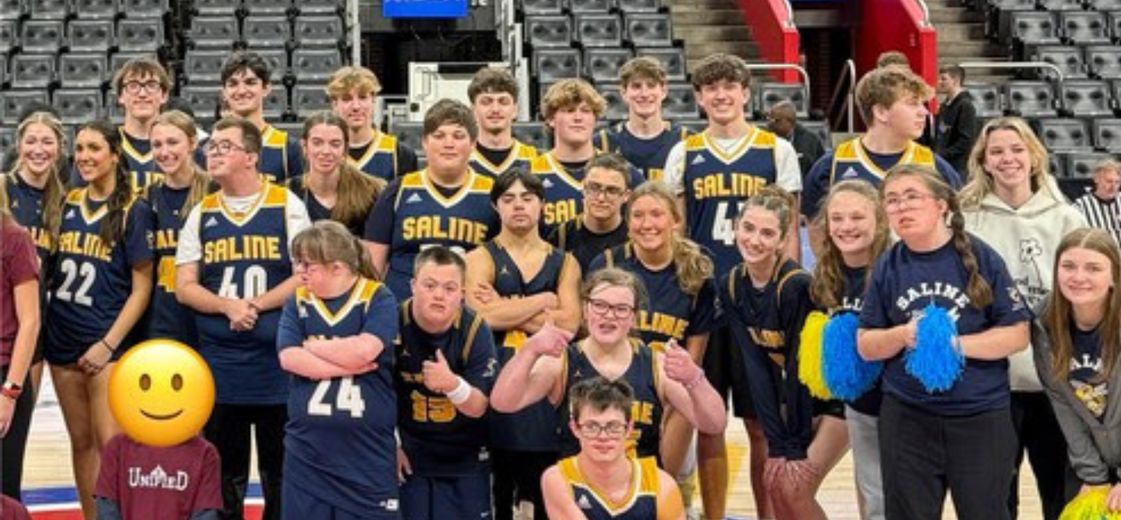 Saline Unified Basketball athletes posing for a picture at Little Ceasars