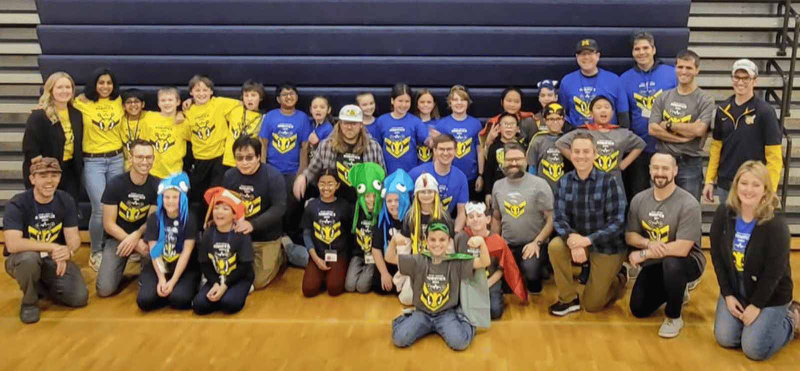 Heritage Robotics Teams pose with their coaches