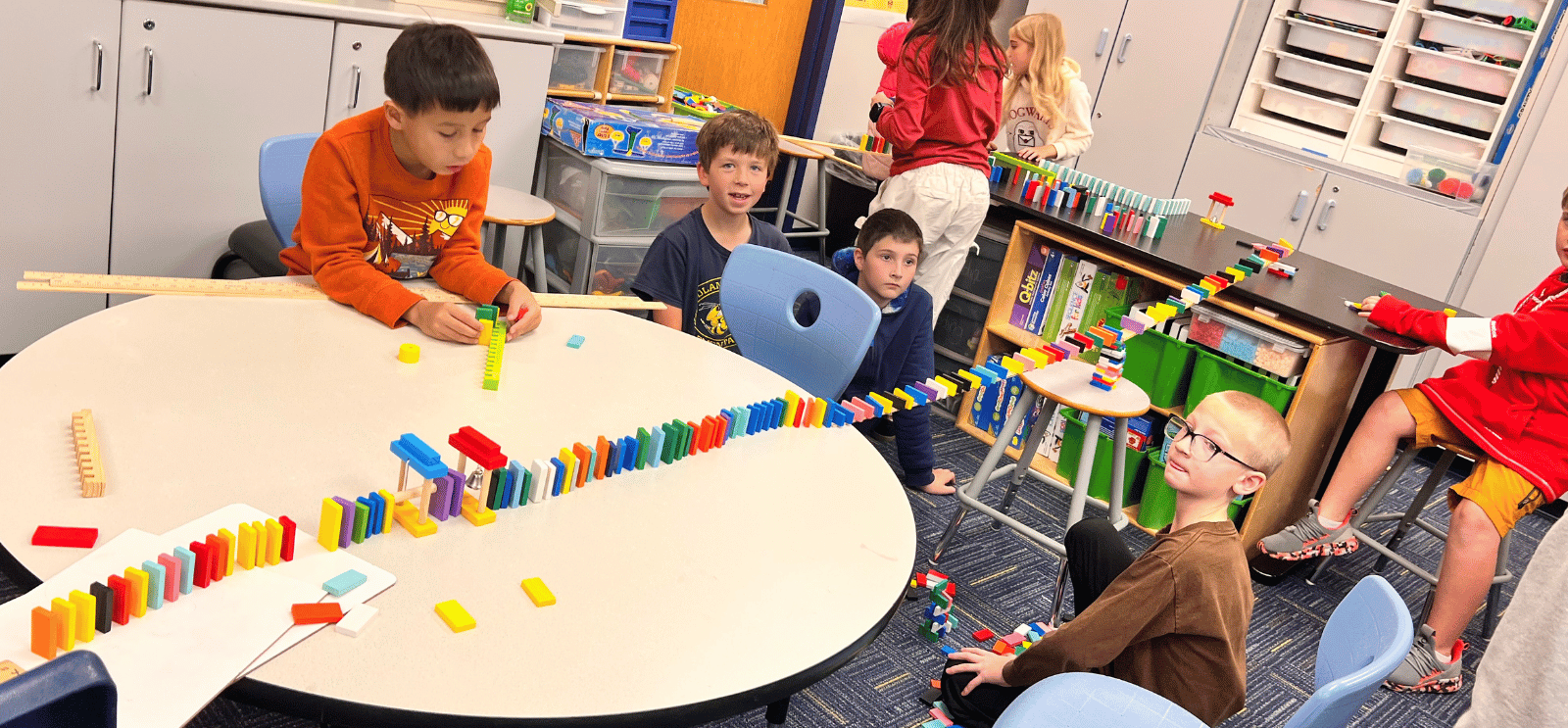 WM students creating a domino track